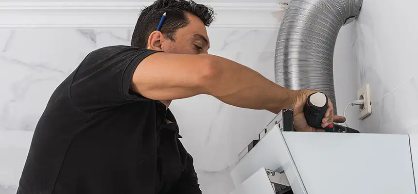 Precision In-wall Dryer Vent Cleaning & Rerouting Corrections in Miami Beach, FL